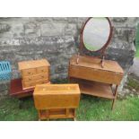 An oak gateleg table, a chest of drawers, stained stool, oak tea trolley, and swing frame toilet