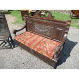An antique style oak settle, moulding missing, af, width 53ins x height 48ins, together with an