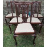 A set of 6 Chippendale style chairs, with pierced splats, raised on front cabriole legs