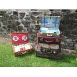 A collection of luggage, together with two cased picnic sets