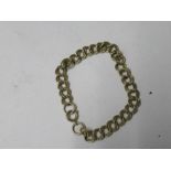 A 9 carat gold bracelet, of double curb links to a bolt ring clasp, 11.4g gross