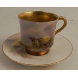 A Royal Worcester miniature cup and saucer, decorated with sheep in landscape by Jas Stinton,