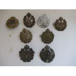 A collection of 8 cap badges relating to the Royal Air Force and Royal Flying Corps, to include