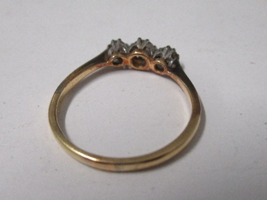 An 18carat gold and platinum three stone diamond ring, finger size S - Image 3 of 4