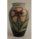 A Moorcroft vase, decorated in the Dianthus pattern, height 4ins no obvious signs of restoration