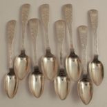 A set of eight Georgian silver fiddle pattern tea spoons, with engraved decoration and initials,