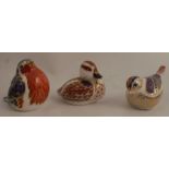 Three Royal Crown Derby paperweights, of a duck and two birds, all with gold stoppers - no signs