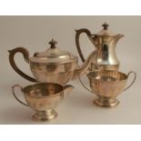 A silver four piece tea and coffee set,  with facetted body, Birmingham 1930, weight 45oz all in