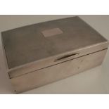 A silver cigarette box, with engine turning to the top, Birmingham 1913, 5.5ins x 3.5ins, height 1.