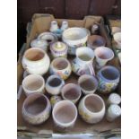 A collection of Poole pottery items, including vases, jugs, condiment sets, salt and peppers,