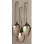 Three Irish Georgian silver serving spoons, all engraved with a crest, Dublin 1820, maker James