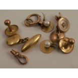 An 18ct gold cufflink and three dress studs, weight 9g all in, together with a 9ct gold cufflink and