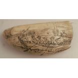 A Scrimshaw tooth, carved with to the one side with a whale and sailors in a row boat and with a