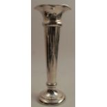 A silver trumpet vase, with flared rim, Birmingham 1912, weight 14oz all in (loaded base), height