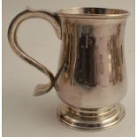 An 18th century silver mug, of baluster form, engraved with initials to the handle, Newcastle