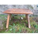 A primitive style oak stool, 13ins x 8.5ins x height 9ins