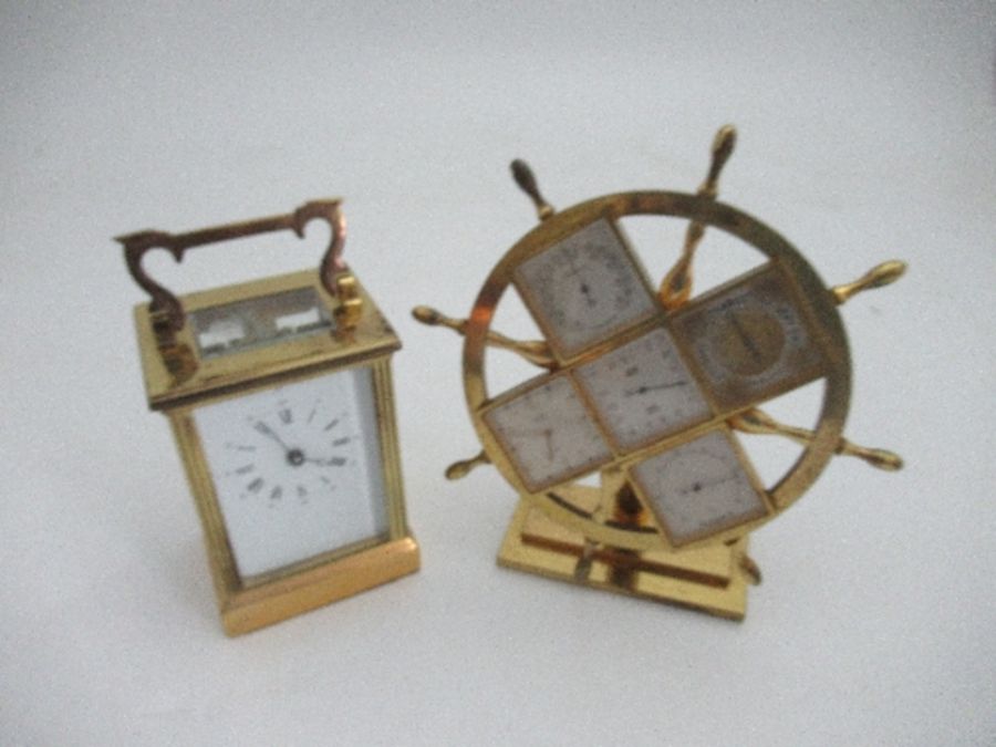 An Angelus pilot wheel, with calendar, barometer, hygrometer and thermometer, height 7ins,