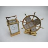 An Angelus pilot wheel, with calendar, barometer, hygrometer and thermometer, height 7ins,