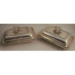 A pair of 19th century Paul Storr silver rectangular entrée dishes and covers, having gadrooned