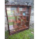 An Eastern hardwood  hanging display cabinet, height 23ins, width 19ins