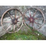 A pair of wrought iron cart wheels, diameter 30ins
