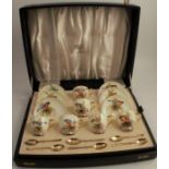 A Royal Worcester cased coffee set, comprising six cups and saucers, decorated with named birds by