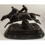 A 20th century bronze sculpture, The Last Fence, two horses and jockeys, signs of signature to