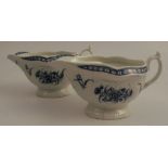 A pair of First Period Worcester blue and white sauce boats, decorated with flowers to an embossed