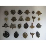 A quantity of British infantry military badges, to include Princess of Wales's Royal Regiment,