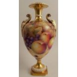 A Royal Worcester vase, raised on a plinth, decorated all around with hand painted fruit by