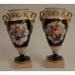 A pair of Chamberlains Worcester pedestal vases, decorated with reserves of flowers, to a deep