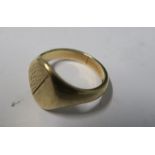 A 9 carat gold signet ring, the oval head with half textured decoration, finger size T, 6.9g gross
