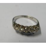 A five stone diamond 18 carat white gold ring, the uniform brilliant cuts totalling approximately