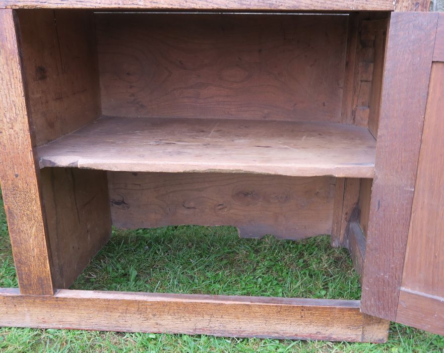 An antique oak Welsh sideboard, with three drawers to the frieze, above cupboard doors to each side, - Image 3 of 6