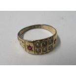 An Edwardian seed pearl and stone set ring, finger size P, 2.6g gross
