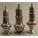 Three Georgian silver sugar casters, all of traditional form and engraved with a crest, London 1730,