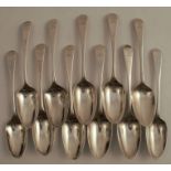 A set of eleven mid 18th century silver dessert spoons, engraved with a crest, all bottom marked,