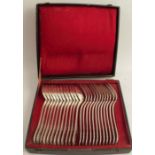 A cased set of twelve French silver serving spoons and forks, weight 65oz