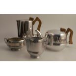 A Picquot ware four piece tea set, comprising hot water jug, tea pot, sugar bowl and milk jug