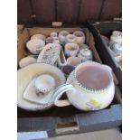 A collection of Poole pottery items, including large jug, vases, condiment pots, etc.