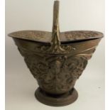A brass coal scuttle, with Victorian diamond registration mark, by Benham and Froud, height 17.