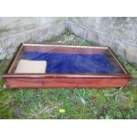 A mahogany framed table top glazed display cabinet, with rising lid, 12ins x 24ins x height 4ins