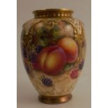 A Royal Worcester quarter lobbed vase, decorated to the front with fruit to a mossy background by