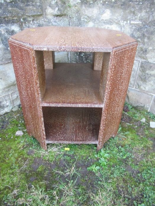 A 1930's Art Deco Heals octagonal limed oak book table, stamped number to base