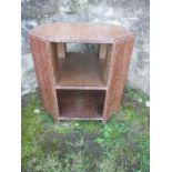 A 1930's Art Deco Heals octagonal limed oak book table, stamped number to base