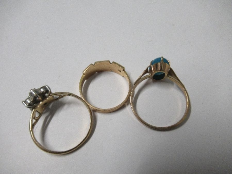 A 15 carat gold seed pearl set ring, together with a 9 carat gold oval turquoise ring, and a 9 carat - Image 2 of 4