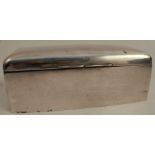 A silver cigarette box, of rectangular form, with domed lid, London 1893, 7.5ins x 4ins, height 2.