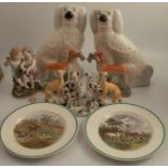 A pair of Staffordshire seated spaniels, together with three other pairs of Staffordshire dogs,