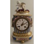 A porcelain mantel clock, the drum movement stamped Dixon & Co Paris, with enamel dial, the