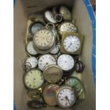 An assortment of pocket watches and parts